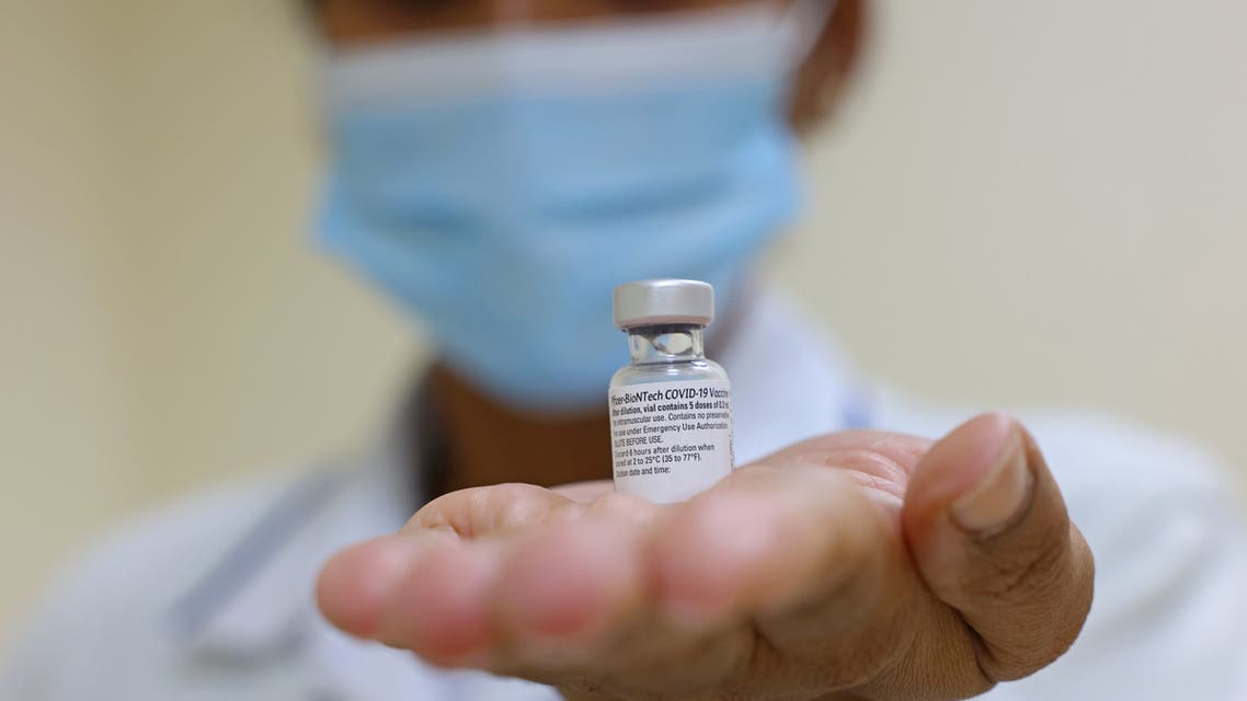 A nurse displays a dose of the Pfizer-BioNTech COVID-19 vaccine. (AFP)