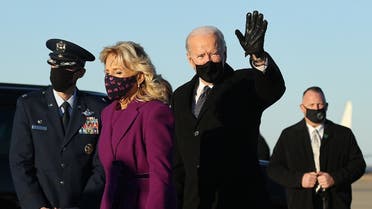 President-elect Joe Biden (R) and Dr. Jill Biden arrive at Joint Base Andrews the day before he will be inaugurated as the 46th president, Jan. 19, 2021. (AFP)