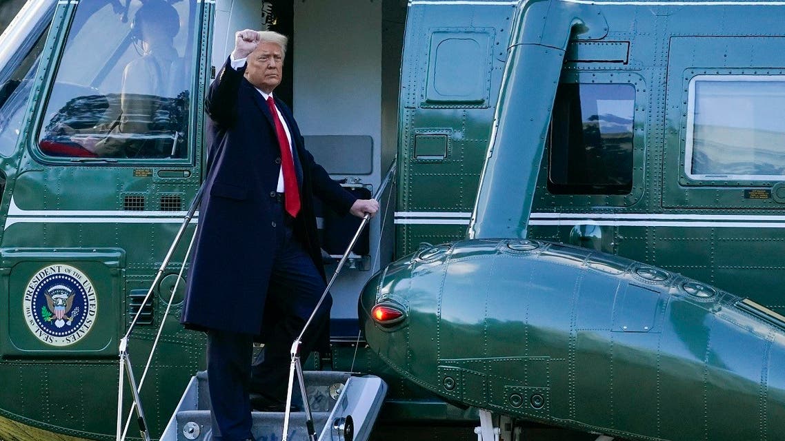 President Donald Trump gestures as he boards Marine One, Jan. 20, 2021, in Washington. (AP)