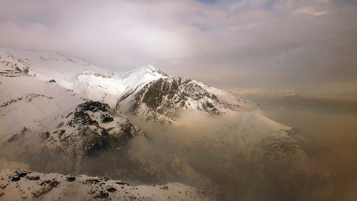 Air pollution blankets a mountain range in Tehran, Iran. (AP)