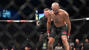 A file photo shows Ottman Azaitar (red gloves) fights Teemu Packalen (blue gloves) during UFC 242 at The Arena, Abu Dhabi, UAE. (Per Haljestam-USA TODAY Sports via Reuters)