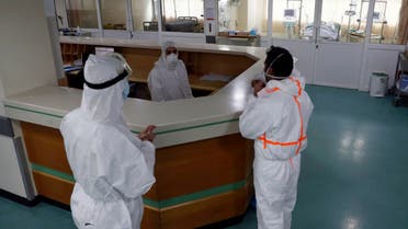 Medical staff stand at the intensive care unit of the Rafik Hariri University Hospital in Beirut, Lebanon. (AP)
