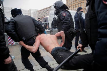 Law enforcement officers detain a man during a rally in support of jailed Russian opposition leader Alexei Navalny in Moscow, Russia January 23, 2021. (Reuters)