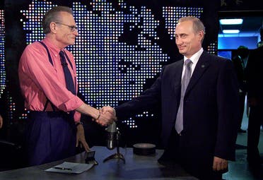 Russian President Vladimir Putin shakes hands with Larry King before a taping of The Larry King Show in New York, U.S, September 8, 2000. (Reuters)