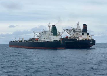Iranian-flagged MT Horse, left, and Panamanian-flagged MT Frea tankers are seen anchored together in Pontianak waters off Borneo island, Indonesia, Sunday, Jan. 24, 2021. (Indonesian Maritime Security Agency via AP)