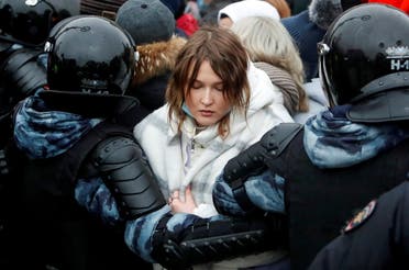 Law enforcement officers detain a woman during a rally in support of jailed Russian opposition leader Alexei Navalny in Moscow, Russia January 23, 2021. (Reuters)