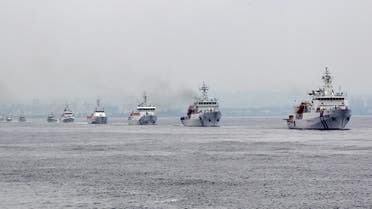 Taiwan Coast Guard patrol ships are seen during a drill held about 4 nautical miles out of the port of Kaohsiung, southern Taiwan, June 6, 2015. Taiwan's coast guard on Saturday commissioned its biggest ships for duty, in the form of two 3,000-ton patrol vessels, as Taipei boosts its defences amid concerns about China's growing footprint in the disputed South China Sea. REUTERS/Pichi Chuang