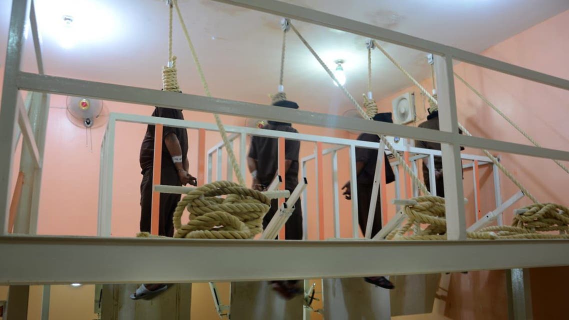 A handout picture released by the Iraqi Justice Ministry on June 29, 2018 shows the execution by hanging of jihadists of the Islamic State group who were on death row. Iraq executed a dozen death row jihadists on the order of Prime Minister Haider al-Abadi, his office said today, in retaliation for the Islamic State group's execution of eight captives. The executions on June 28 came shortly after Abadi ordered the immediate implementation of the death sentences of hundreds of convicted jihadists in response to the killings by IS.