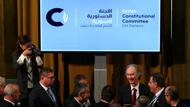 U.N. Special Envoy for Syria Geir Pedersen talks with Ahmad Kuzbari, co-chair for the Syrian Government, and other members ot their delegation after the first meeting of the new Syrian Constitutional Committee at the United Nations in Geneva, Switzerland, October 30, 2019. REUTERS/Denis Balibouse