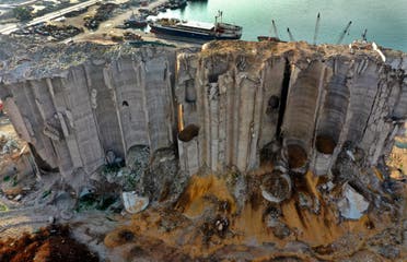 Rubble, spilled grains remain around towering silos gutted in the massive August explosion at the Beirut port that claimed the lives of more than 200 people, in Beirut, Lebanon. (AP)