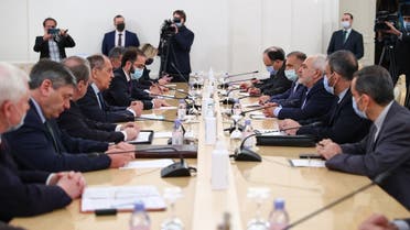 Russian Foreign Minister Sergei Lavrov meets with his Iranian counterpart Mohammad Javad Zarif in Moscow on January 26, 2021. (Russian Foreign Ministry/AFP)