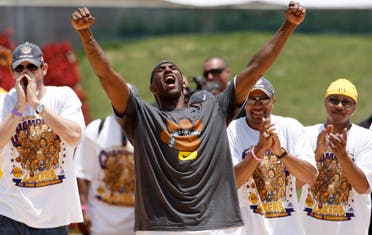 Kobe Bryant celebrates while on stage during the Lakers' NBA championship victory rally at the Los Angeles Memorial Coliseum in Los Angeles on Wednesday, June 17, 2009. (AP)