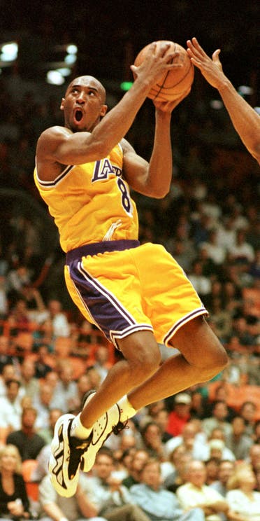 Kobe Bryant of the Los Angeles Lakers goes in for a layup against the Utah Jazz during the second half of their playoff game Thursday, May 8, 1997. (AP)