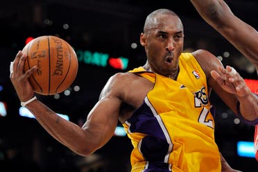 Kobe Bryant goes up for a shot during the second half of their NBA basketball game against the Philadelphia 76ers, Friday, Dec. 31, 2010, in Los Angeles. (AP)