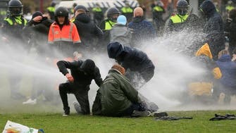 Coronavirus: Police detain 100 in Amsterdam after protest over lockdown, curfew