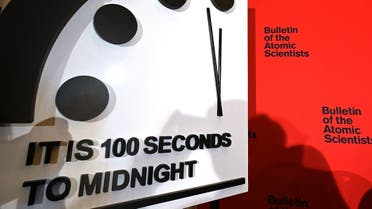 In this file photo taken on January 23, 2020 the Doomsday Clock reads 100 seconds to midnight during an announcement at the National Press Club in Washington, DC. (Eva Hambach/AFP)