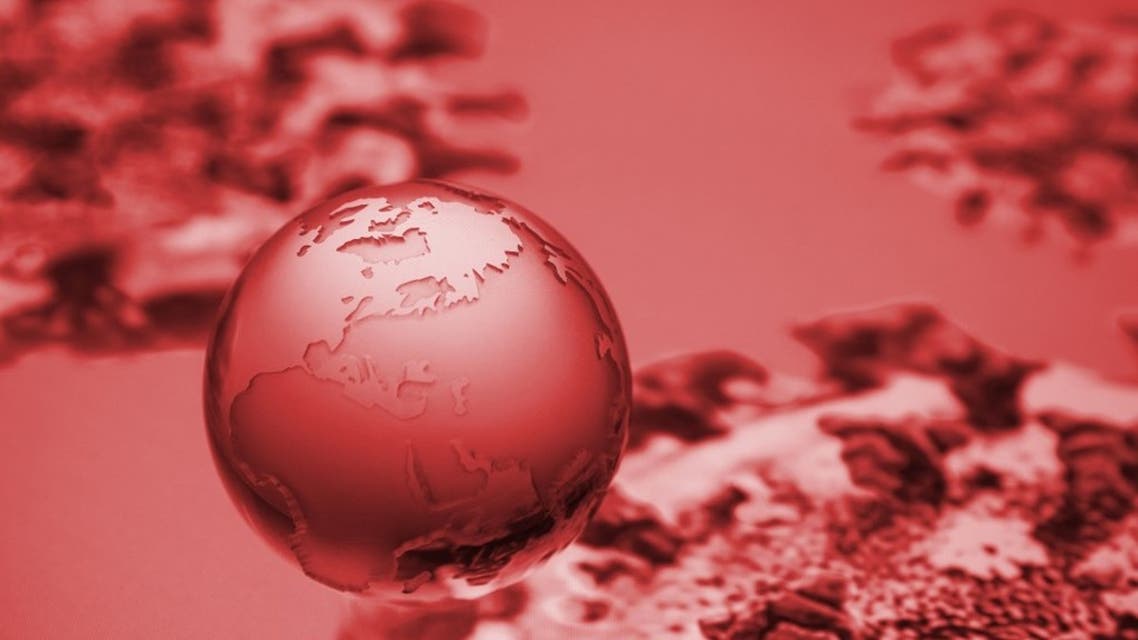A globe showing Europe, Africa and Asia is pictured on an illustration representation of COVID-19, the disease caused by the novel coronavirus in Paris on April 24, 2020. (AFP)