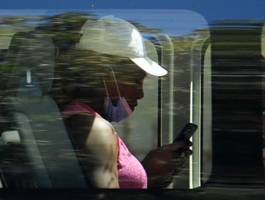 Serena Williams is seen in a bus returning from training to the accommodation in North Adelaide on January 23, 2021, where tennis players are undergoing mandatory quarantine ahead of the Australian Open. (Reuters)