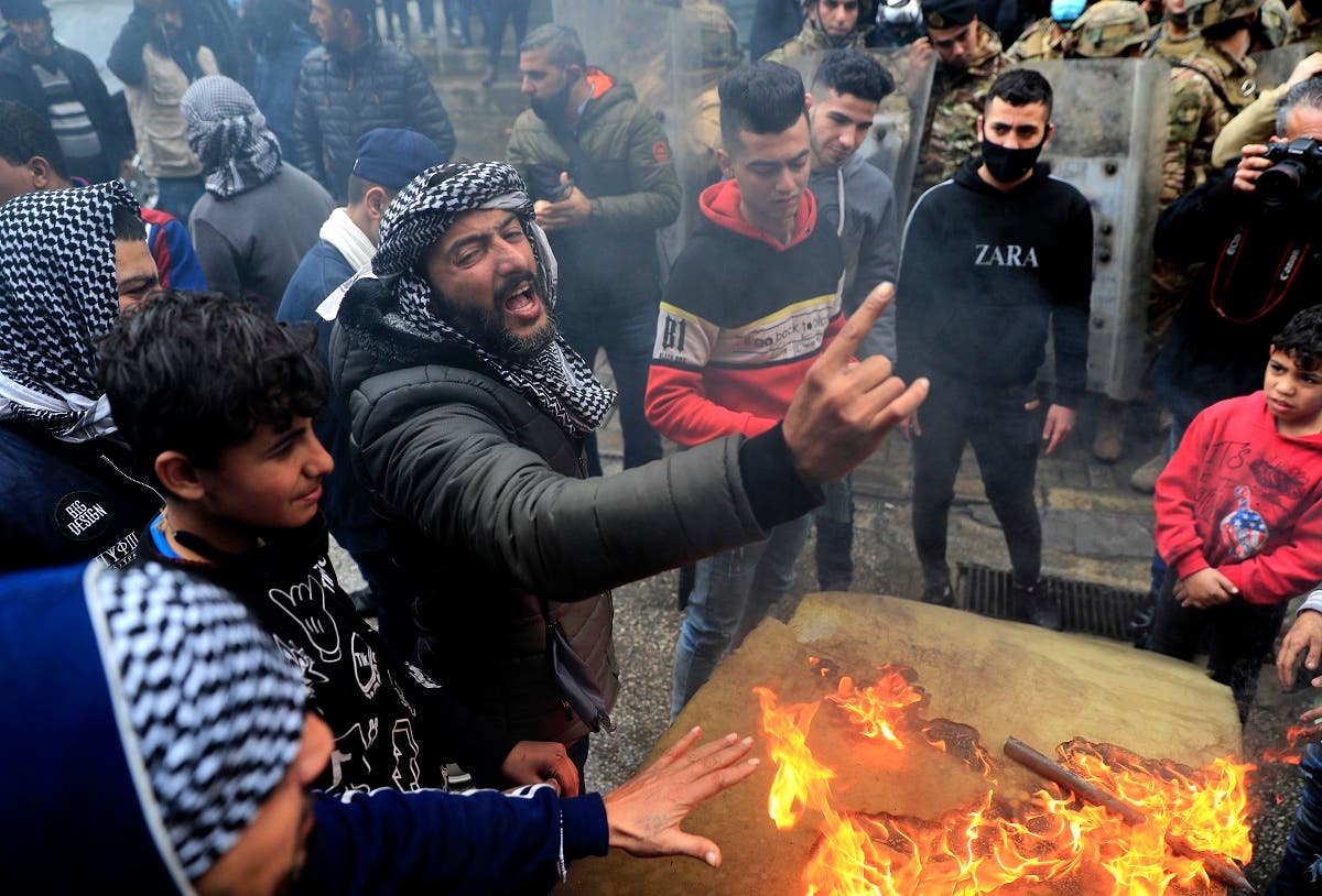 Protesters take to the streets in the northern city of Tripoli, Lebanon, Jan. 28, 2021. (AP)