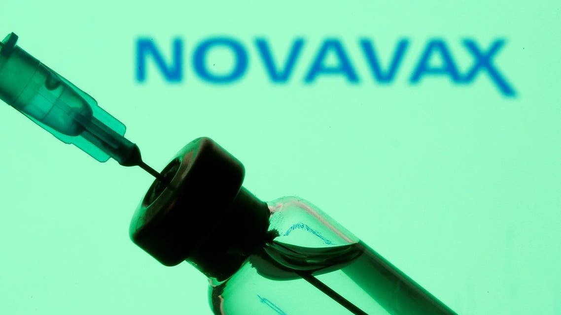 Vial and sryinge are seen in front of displayed Novavax logo in this illustration taken. (Reuters)