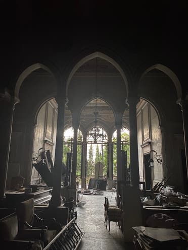 Sursock Palace's main hall after the blast, showing shattered triple arcade windows. (Photo by Bassam Lahoud)