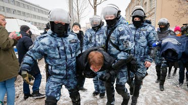 Police officers detain a man during a protest against the jailing of opposition leader Alexei Navalny in Moscow, Russia, on Jan. 31, 2021. (AP)