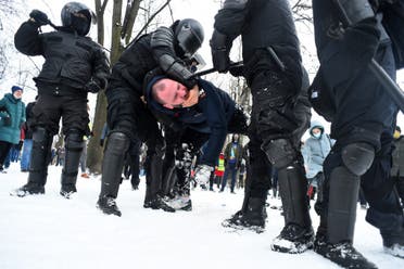 Police detain a man during a rally in support of jailed opposition leader Alexei Navalny in Saint Petersburg on January 31, 2021. (AFP)