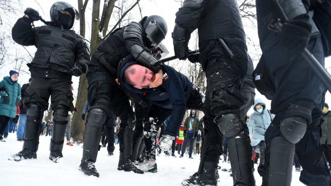 Police detain a man during a rally in support of jailed opposition leader Alexei Navalny in Saint Petersburg on January 31, 2021. (AFP)
