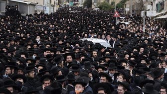 Thousands of ultra-Orthodox Israelis join Jerusalem funeral, flout coronavirus rules