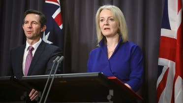 A file photo shows British International Trade Secretary Liz Truss  and Australian Trade Minister Simon Birmingham, left, at a press conference in Canberra, Australia, Sept. 18, 2019. (AP /Rod McGuirk)