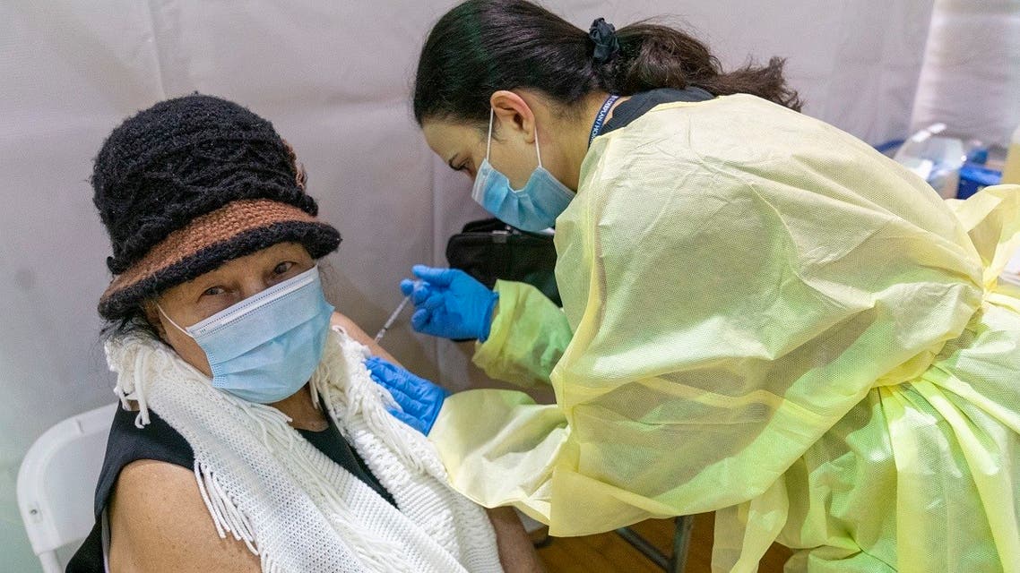 Registered Nurse Rita Alba gives a patient the first dose of the coronavirus vaccine at a pop-up COVID-19 vaccination site in the Bronx, Jan. 31, 2021. (AP)