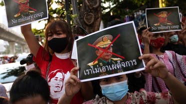 NLD supporters rally outside Myanmar's embassy after the military seized power from a democratically elected civilian government and arrested its leader Aung San Suu Kyi, in Bangkok, on February 1, 2021. (Reuters)