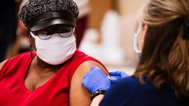 Shanta King receives the Moderna COVID-19 vaccine at the Louisville Urban League on January 20, 2021 in Louisville, Kentucky. (AFP)
