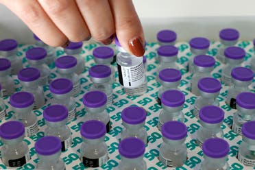 A health worker prepares a dose of the Pfizer-BioNtech COVID-19 vaccine at Clalit Health Services, Israeli city of Petah Tikva, on February 1, 2021. (File photo: AFP)