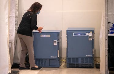 A nurse retrieves a syringe of the COVID-19 vaccine from refrigeration to inoculate health care workers at Ronald Reagan UCLA Medical Center on December 16, 2020 in Westwood, California. (File photo: AFP via Getty)