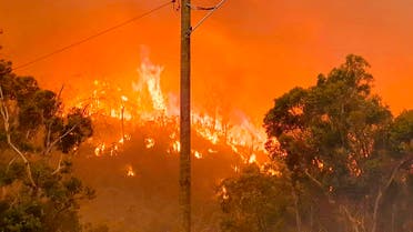 In this photo provided by Department of Fire and Emergency Services, fire burns on a hill at Wooroloo, near Perth, Australia, Monday, Feb. 1, 2021. (AP)