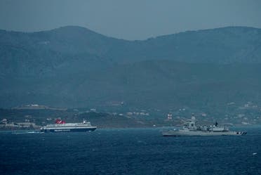 A picture taken on March 23, 2016 from Cesme district in Izmir, western Turkey, shows a Dutch NATO warship patrolling the Aegean Sea between the Turkish coast and the Greek Chios island on March 23, 2016. (AFP)