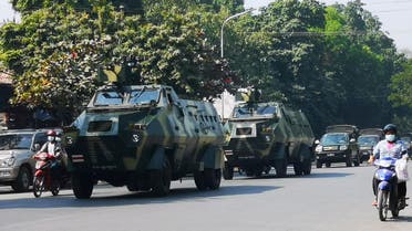 Myanmar Army armored vehicles drive past a street after they seized power in a coup in Mandalay, Myanmar February 2, 2021. REUTERS/Stringer NO RESALES NO ARCHIVES