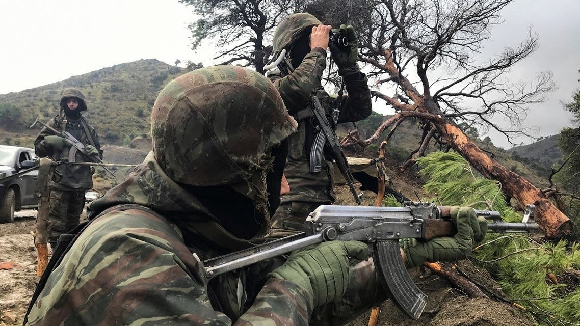 Algerian soldiers take positions during an operation against extremist militants, in the Ain Defla mountains, west of the capital Algiers, Algeria January 26, 2021. (Reuters/Abdelaziz Boumzar)