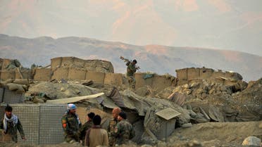 Afghan security force personnel arrive at the site of a car bomb attack in Sherzad district of Nangarhar Province on January 30, 2021. (AFP)