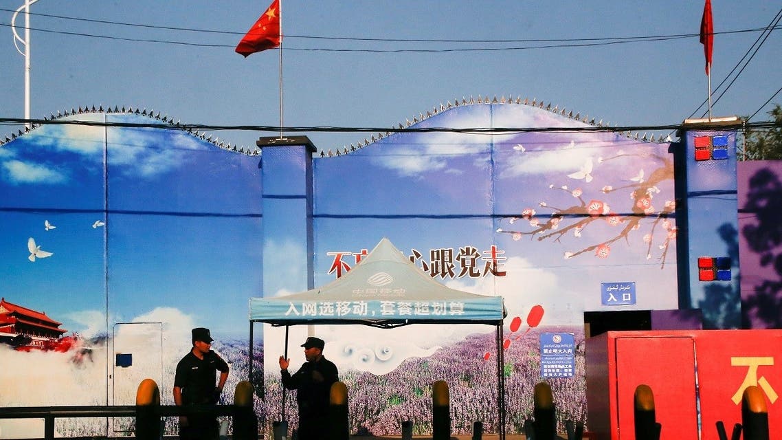 Security guards stand at the gates of what is officially known as a vocational skills education center in Huocheng County in Xinjiang Uighur Autonomous Region, China. (File photo: Reuters)