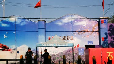 Security guards stand at the gates of what is officially known as a vocational skills education center in Huocheng County in Xinjiang Uighur Autonomous Region, China. (File photo: Reuters)