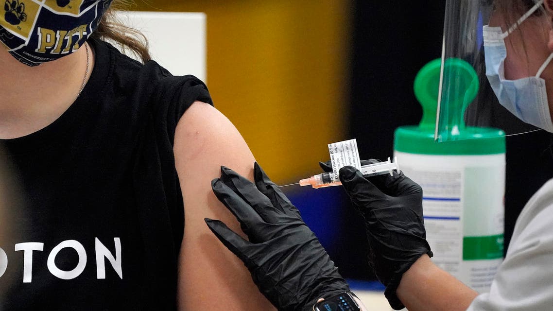 A student receives her first dose of the Moderna COVID-19 Vaccine during a vaccination clinic hosted by the University of Pittsburgh and the Allegheny County Health Department at the Petersen Events Center, in Pittsburgh, Thursday, Jan. 28, 2021. (AP)