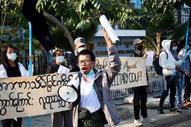 People protest on the street against the military after Monday’s coup, outside the Mandalay Medical University in Mandalay, Myanmar, on February 4, 2021. (Reuters)