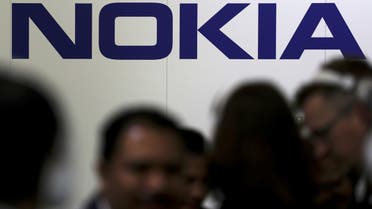 Visitors gather outside the Nokia booth at the Mobile World Congress in Barcelona, Spain. (File photo: Reuters)