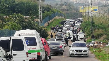 Police gather at a site where Lokman Slim, a prominent Lebanese Shia critic of Iran-backed Hezbollah was found killed in a car. (Reuters)