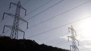 Power lines near British Energy's Heysham Nuclear Power Station are pictured in north-west England. (AFP)