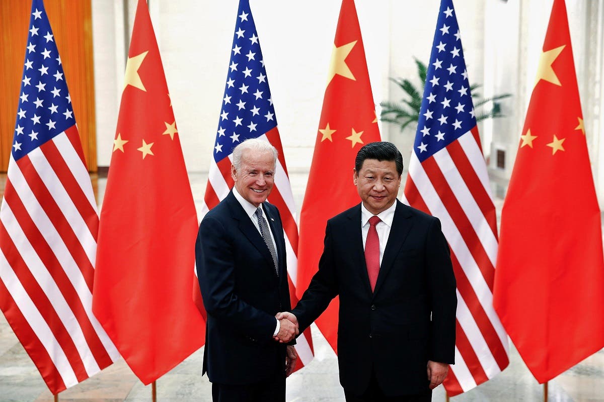 Chinese President Xi Jinping shakes hands with then-US Vice President Joe Biden. (File photo: Reuters)