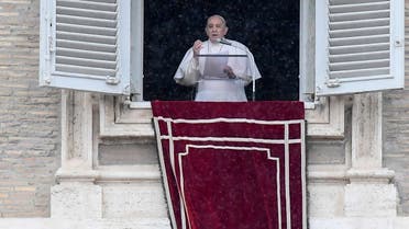 Pope Francis speaks from the window of the apostolic palace overlooking St. Peter’s Square during the weekly Angelus prayer on February 7, 2021 in the Vatican. (Filippo Monteforte/AFP)