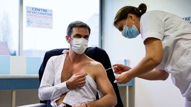 French Health Minister Olivier Veran receives a dose of the AstraZeneca-Oxford COVID-19 vaccine. (AFP)
